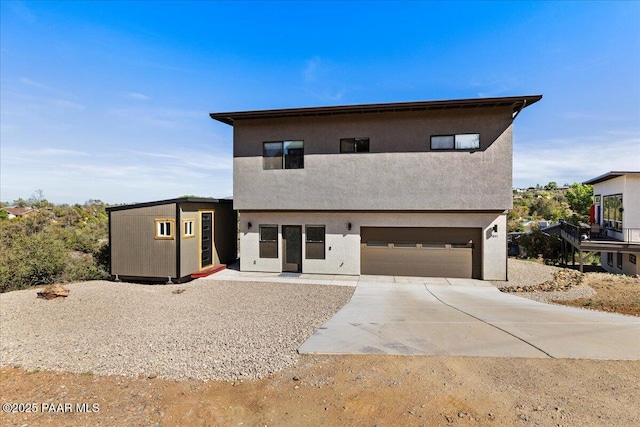 1841 N Jade Cir, Prescott, AZ 86301 - view of front of property featuring concrete driveway, an attached garage, and stucco siding