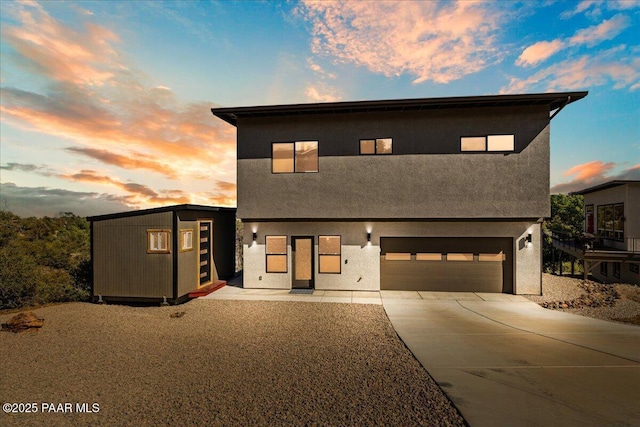 1841 N Jade Cir, Prescott, AZ 86301 - contemporary home featuring concrete driveway, a garage, and stucco siding