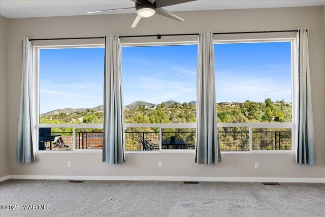 1841 N Jade Cir, Prescott, AZ 86301 - spare room with a ceiling fan, baseboards, and carpet