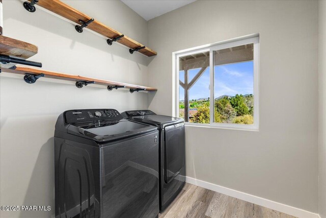 1841 N Jade Cir, Prescott, AZ 86301 - laundry area featuring separate washer and dryer, baseboards, and light wood-type flooring