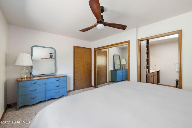 bedroom with a ceiling fan, a closet, and light carpet