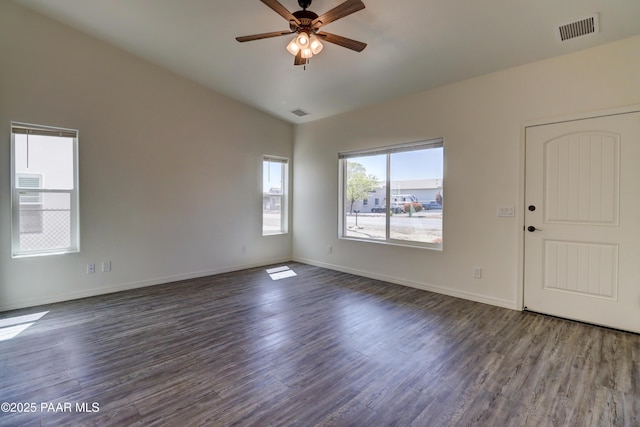 8346 Florentine Rd, Prescott Valley, AZ 86314 - spare room with vaulted ceiling, dark wood finished floors, and a ceiling fan