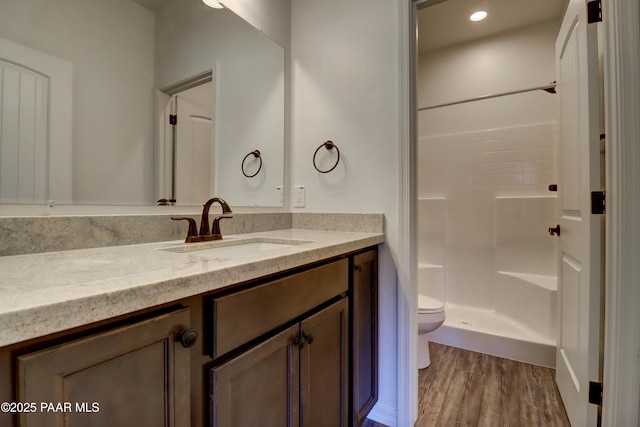8346 Florentine Rd, Prescott Valley, AZ 86314 - bathroom featuring vanity, a shower, and wood finished floors