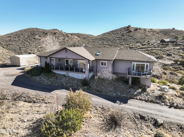 single story home with a mountain view