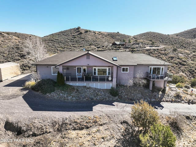 exterior space featuring a mountain view