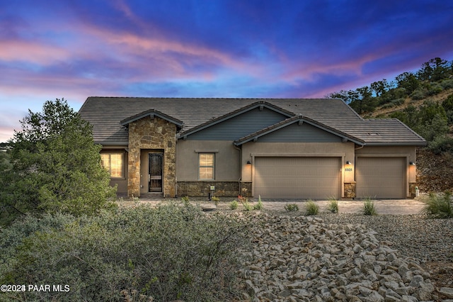 view of front of property featuring a garage