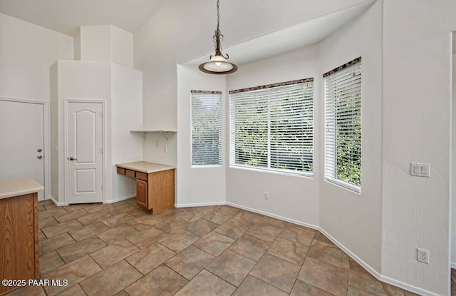 7461 N Windy Walk Way, Prescott Valley, AZ 86315 - unfurnished dining area featuring baseboards