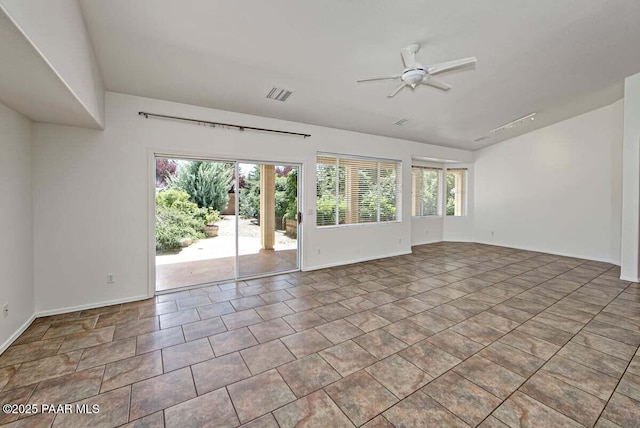 7461 N Windy Walk Way, Prescott Valley, AZ 86315 - spare room with healthy amount of natural light and ceiling fan