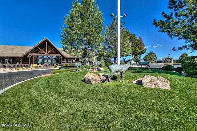 7461 N Windy Walk Way, Prescott Valley, AZ 86315 - view of home's community with a lawn