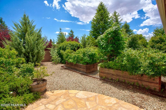 7461 N Windy Walk Way, Prescott Valley, AZ 86315 - view of patio with a garden
