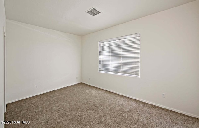 7461 N Windy Walk Way, Prescott Valley, AZ 86315 - empty room with carpet flooring and baseboards