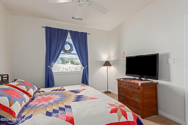 carpeted bedroom featuring ceiling fan