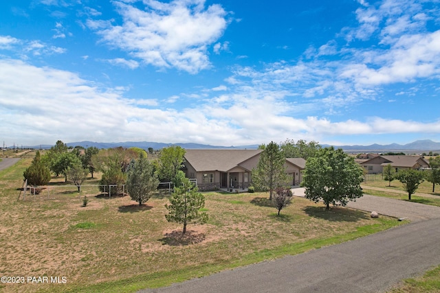 ranch-style house featuring a mountain view