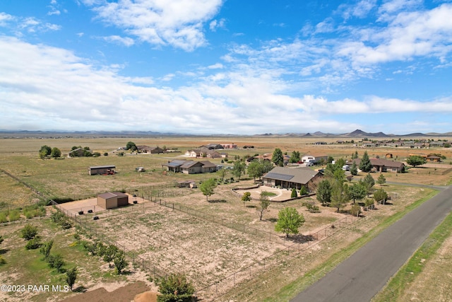 aerial view with a mountain view and a rural view