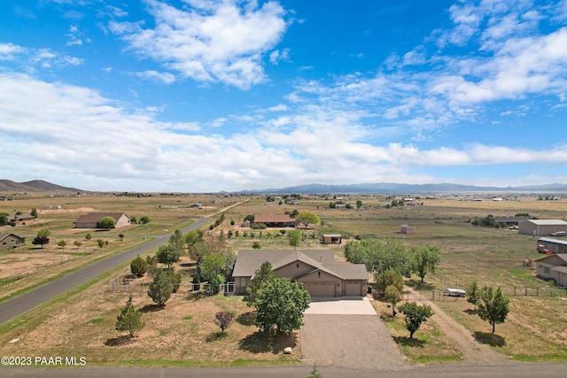 bird's eye view featuring a mountain view and a rural view