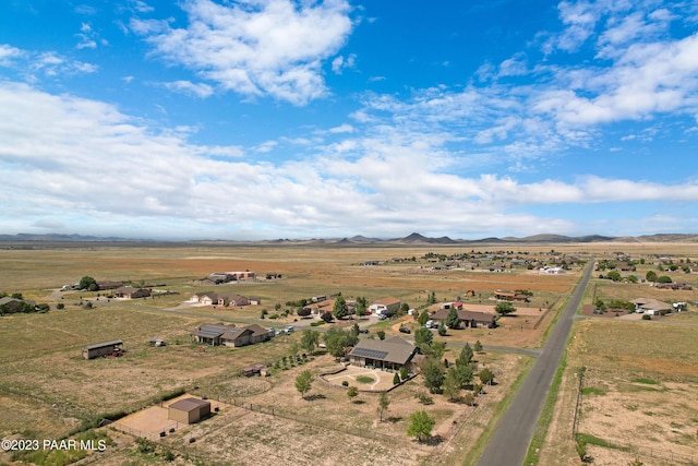 bird's eye view featuring a mountain view and a rural view