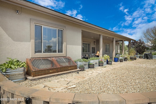 rear view of property with a patio