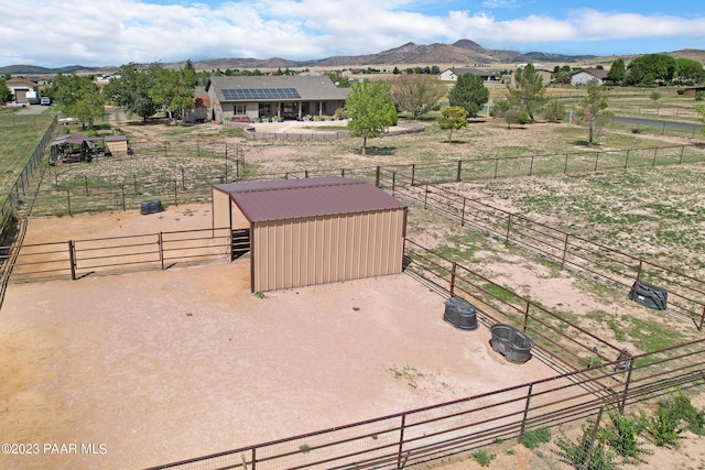 aerial view featuring a mountain view and a rural view