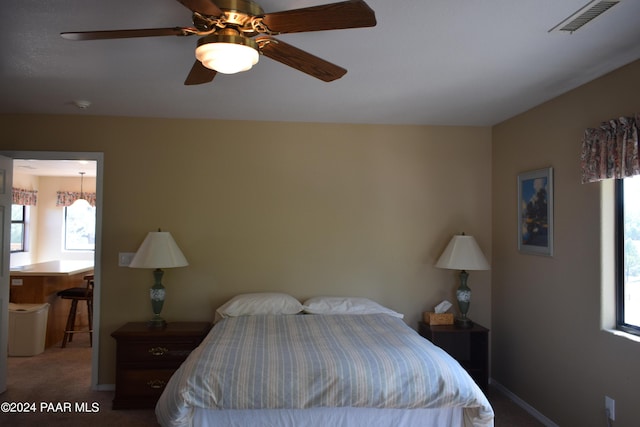 bedroom with carpet and ceiling fan