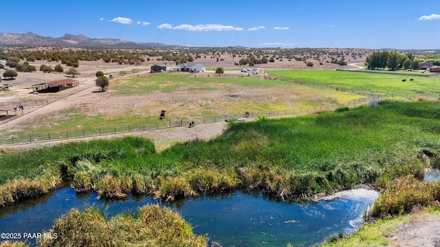 aerial view featuring a rural view and a mountain view