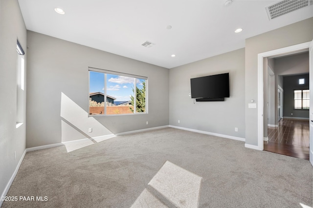 848 Royal Tulips St, Prescott, AZ 86301 - unfurnished living room with carpet floors, healthy amount of natural light, baseboards, and recessed lighting