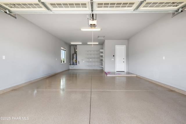 848 Royal Tulips St, Prescott, AZ 86301 - garage with water heater, baseboards, and a garage door opener