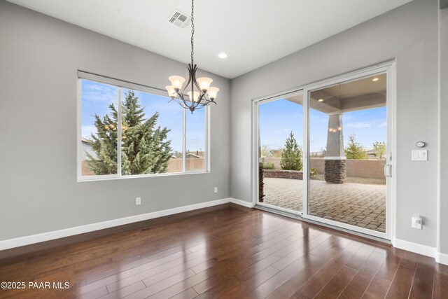 848 Royal Tulips St, Prescott, AZ 86301 - unfurnished room featuring a chandelier, baseboards, dark wood-type flooring, and recessed lighting