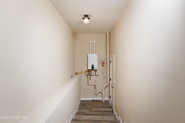 2101 Burlwood Dr, Prescott, AZ 86305 - stairway with tankless water heater and wood finished floors