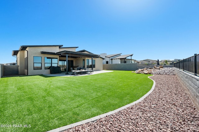 5692 E Cannon Pl, Prescott Valley, AZ 86314 - back of property featuring a fenced backyard, a patio, and stucco siding