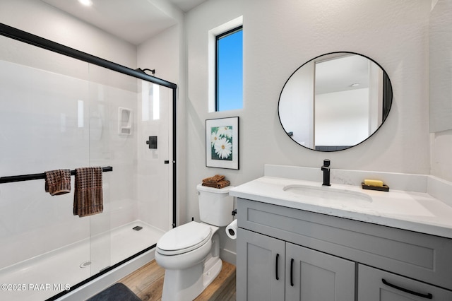 5692 E Cannon Pl, Prescott Valley, AZ 86314 - bathroom featuring vanity, a stall shower, and wood finished floors