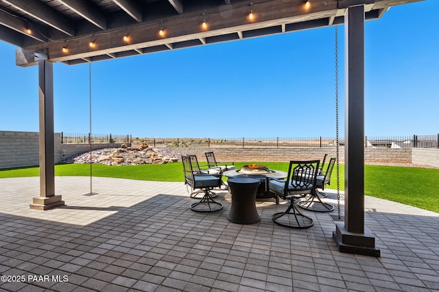 5692 E Cannon Pl, Prescott Valley, AZ 86314 - fenced backyard featuring a patio area and an outdoor fire pit
