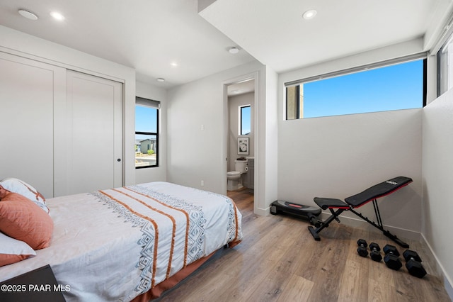 5692 E Cannon Pl, Prescott Valley, AZ 86314 - bedroom with recessed lighting, wood finished floors, and a closet