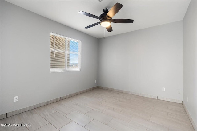 spare room featuring ceiling fan