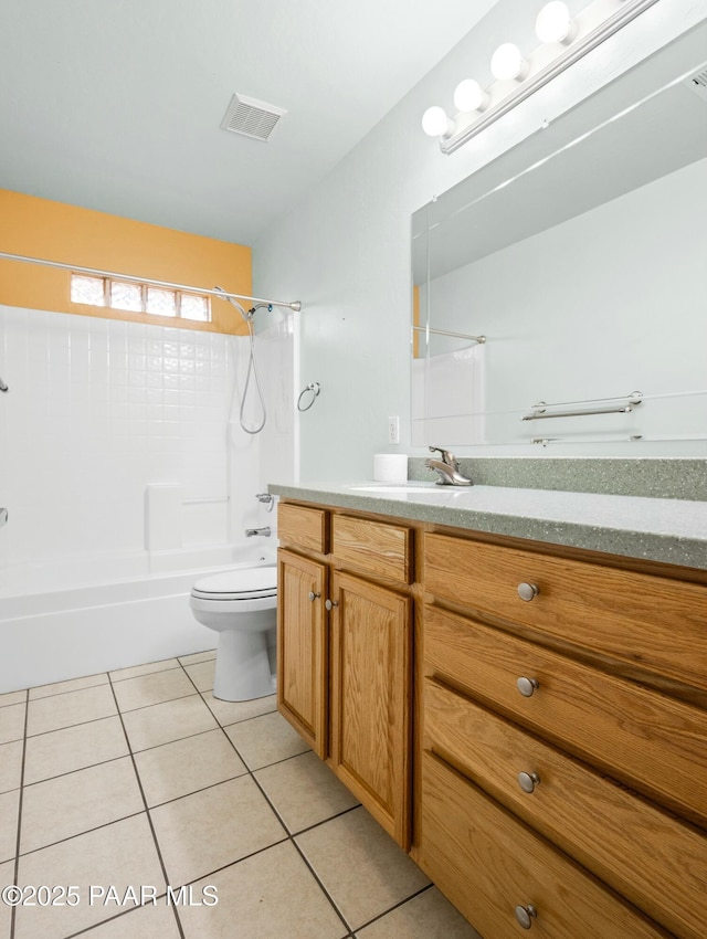 full bathroom with toilet, vanity, shower / bathtub combination, and tile patterned floors