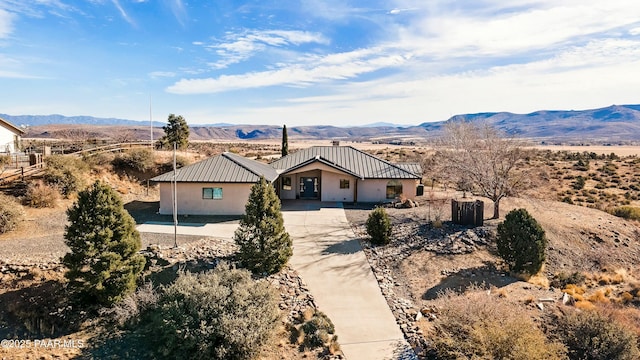 exterior space featuring a mountain view