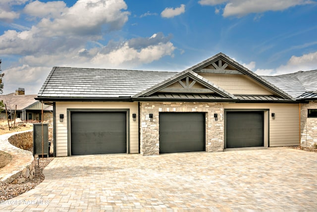 view of front of property featuring a garage