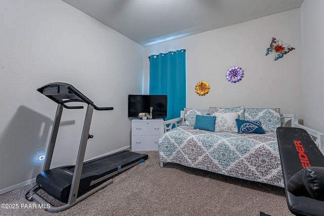 bedroom with carpet floors and vaulted ceiling