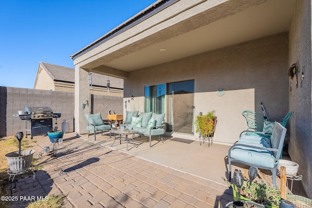 view of patio / terrace featuring a grill and an outdoor living space