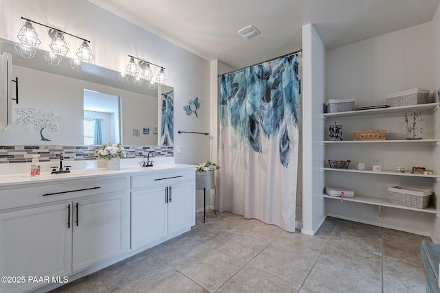 bathroom with walk in shower, backsplash, and vanity