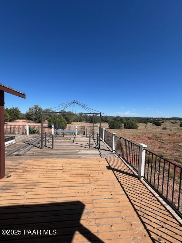 wooden deck with a gazebo