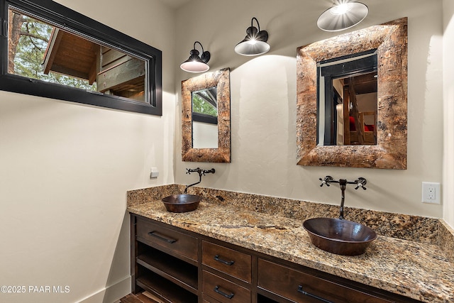8222 N Spring Valley Rd, Parks, AZ 86018 - bathroom featuring double vanity and a sink