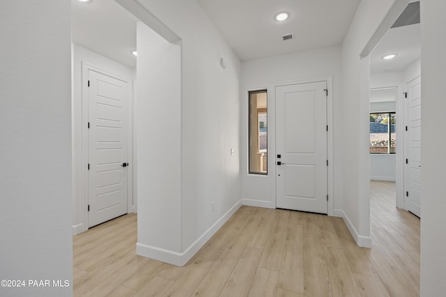 foyer entrance featuring light hardwood / wood-style flooring