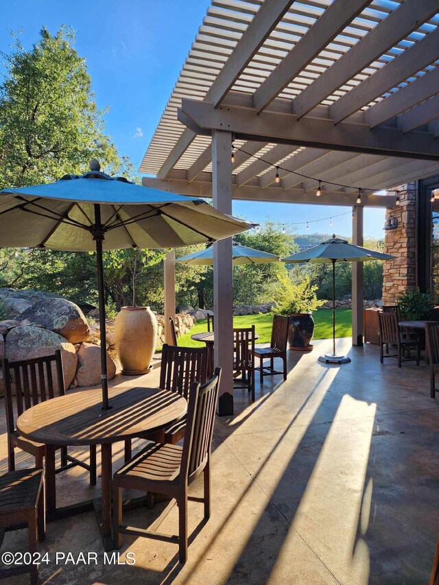 1716 Alpine Meadows Ln Unit 1105, Prescott, AZ 86303 - view of patio featuring a pergola