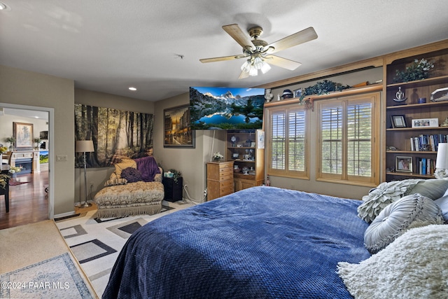 1716 Alpine Meadows Ln Unit 1105, Prescott, AZ 86303 - bedroom with ceiling fan and light colored carpet