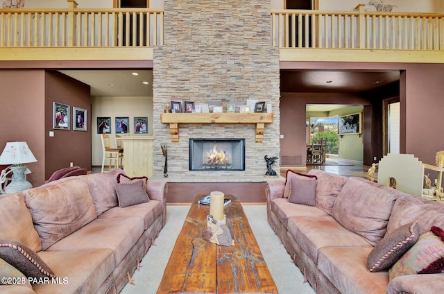6310 N Michele Ln, Prescott, AZ 86305 - living area featuring a towering ceiling, a fireplace, and carpet floors