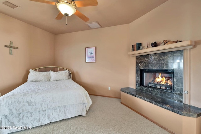 6310 N Michele Ln, Prescott, AZ 86305 - carpeted bedroom with a premium fireplace, baseboards, and ceiling fan