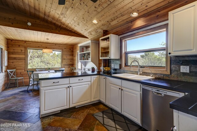 1135 N Rose Quartz Dr, Prescott, AZ 86303 - kitchen with dishwasher, a sink, wooden ceiling, a peninsula, and stone tile floors