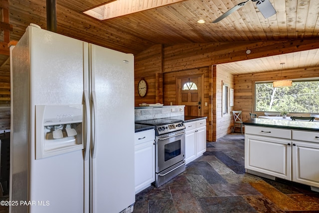 1135 N Rose Quartz Dr, Prescott, AZ 86303 - kitchen with white fridge with ice dispenser, stainless steel electric range, wood ceiling, a skylight, and white cabinetry