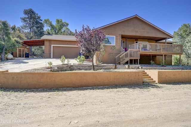 1135 N Rose Quartz Dr, Prescott, AZ 86303 - view of front of house featuring concrete driveway, stairway, and a garage