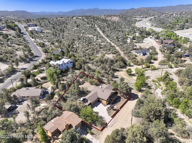 1135 N Rose Quartz Dr, Prescott, AZ 86303 - aerial view of property's location featuring property parcel outlined, a mountainous background, and a desert landscape